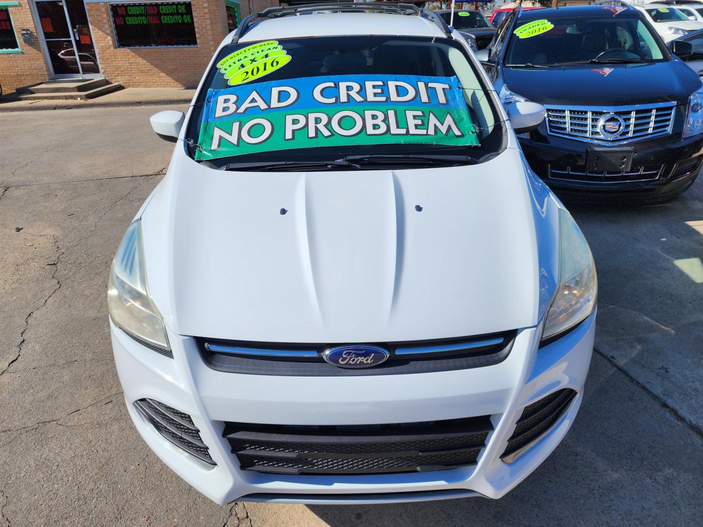 2016 WHITE Ford Escape SE (1FMCU9GX6GU) with an 1.6L L4 DOHC 16V engine, 6-Speed Automatic transmission, located at 2660 S.Garland Avenue, Garland, TX, 75041, (469) 298-3118, 32.885551, -96.655602 - Welcome to DallasAutos4Less, one of the Premier BUY HERE PAY HERE Dealers in the North Dallas Area. We specialize in financing to people with NO CREDIT or BAD CREDIT. We need proof of income, proof of residence, and a ID. Come buy your new car from us today!! This is a Super Clean 2016 FORD ESCAP - Photo#8